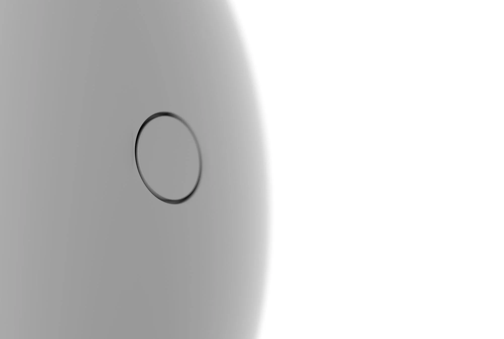 3D render — back face with sync button
